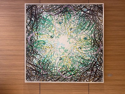 painting on a wall, abstract with black and green highlights