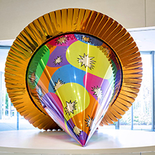 brightly colored party hat sculpture